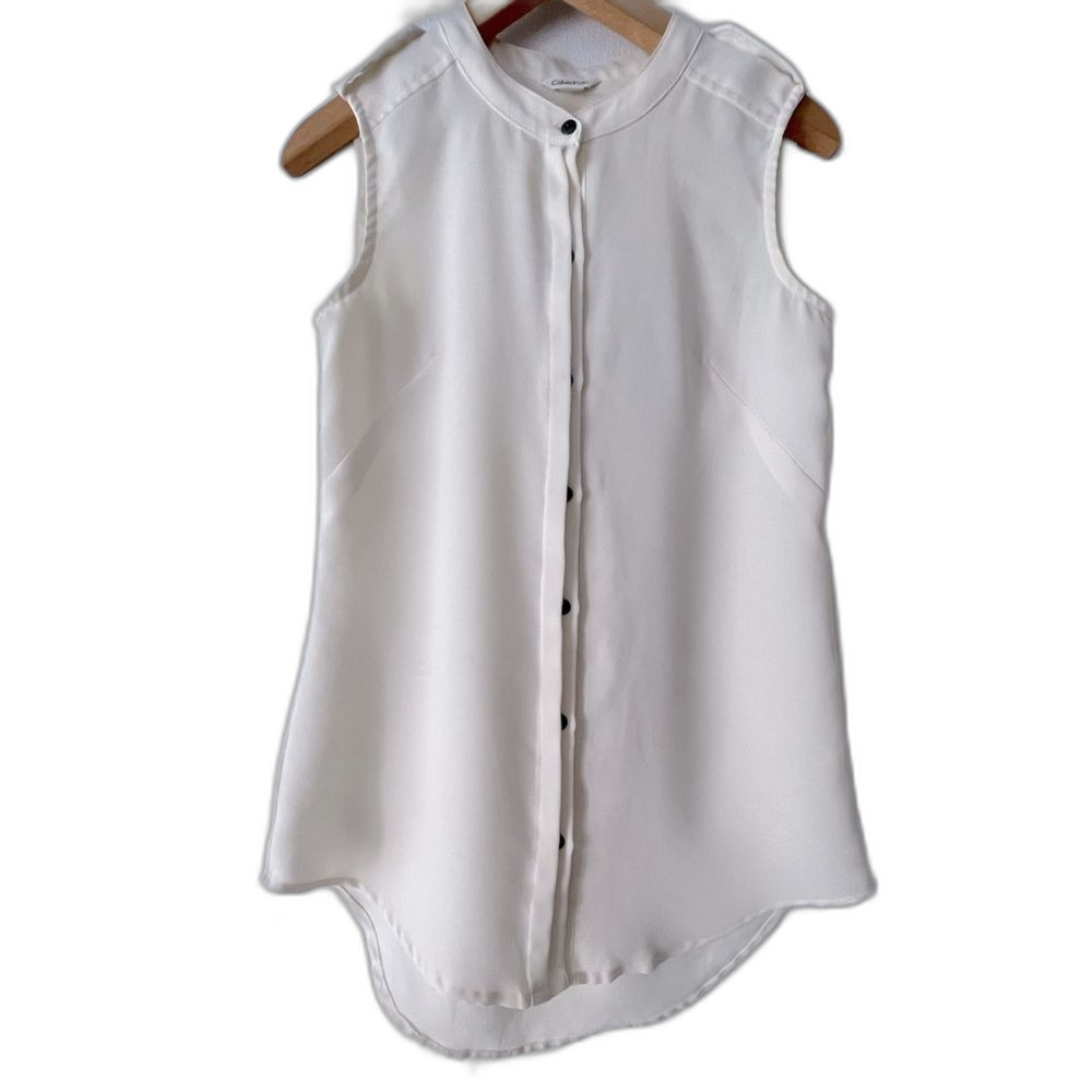 Calvin Klein light tan sleeveless blouse, size XS with lots of unique details
